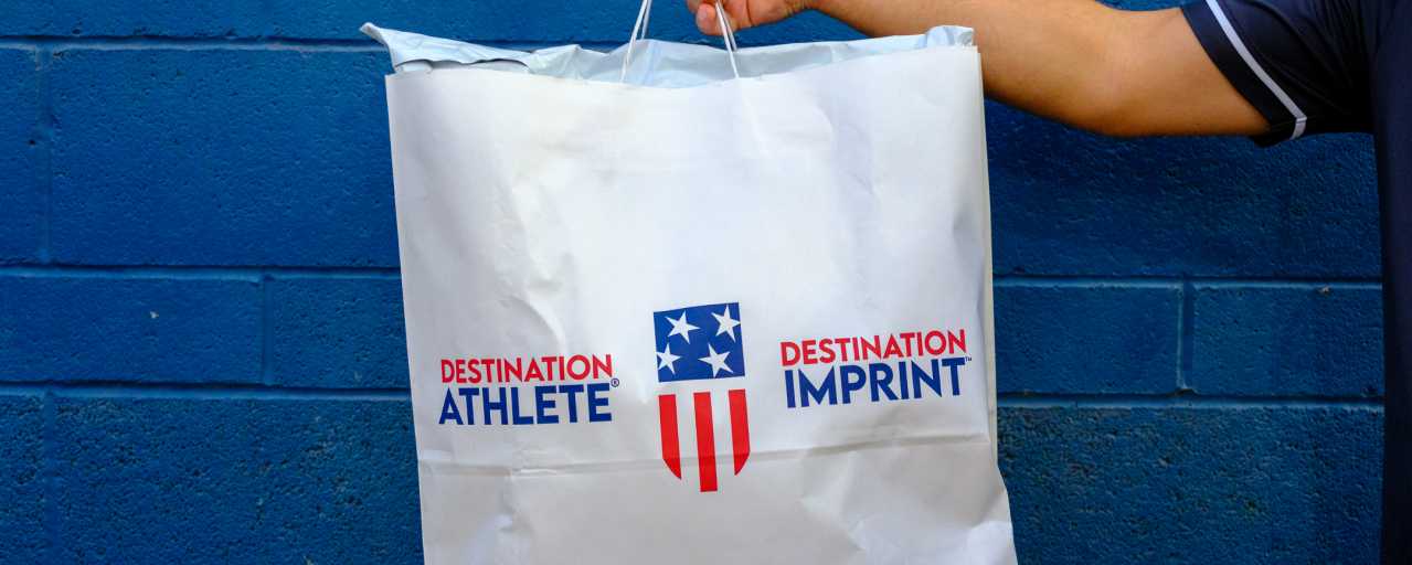 Destination Athlete shopping bag wall display